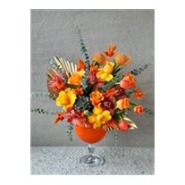 Glass Of Orange Flower