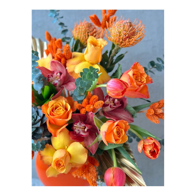 Glass Of Orange Flower