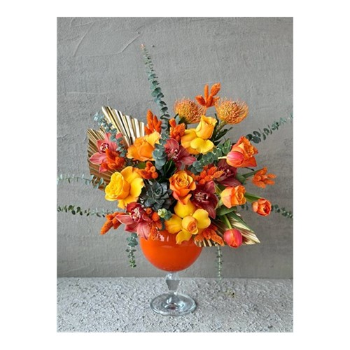 Glass Of Orange Flower